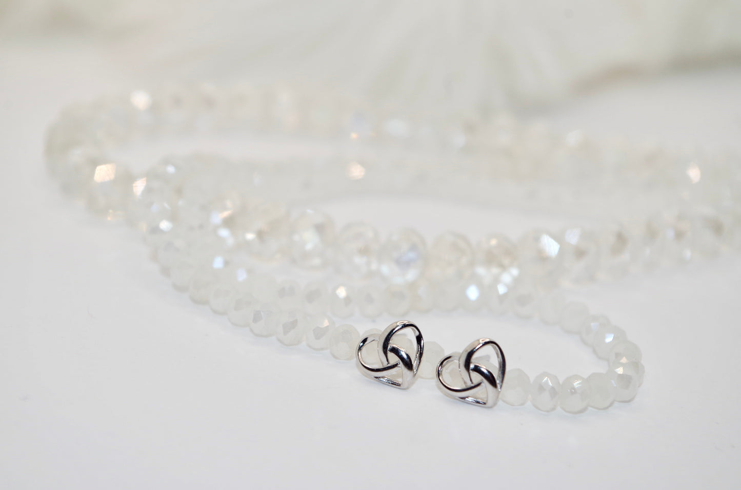 Heart Swizzle Silver Earrings