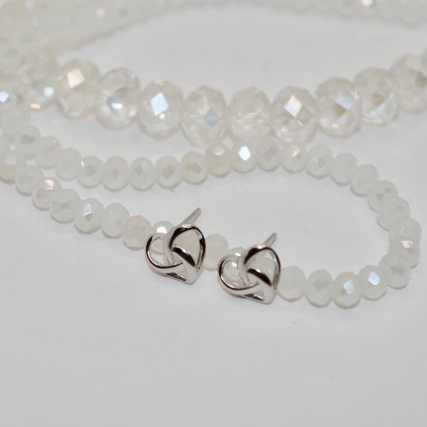 Heart Swizzle Silver Earrings