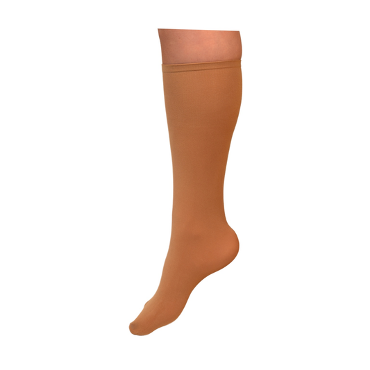 Tan knee-high figure skating sock designed to match skating tights, displayed on a white background.
